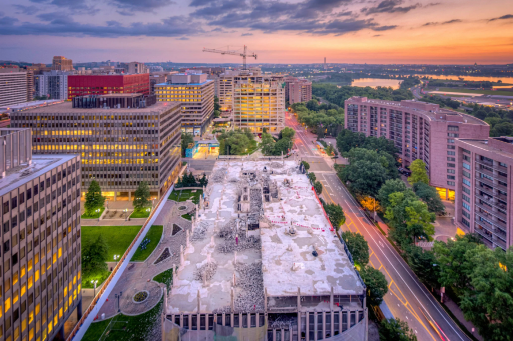 Photo of National Landing skyline and construction site at dusk